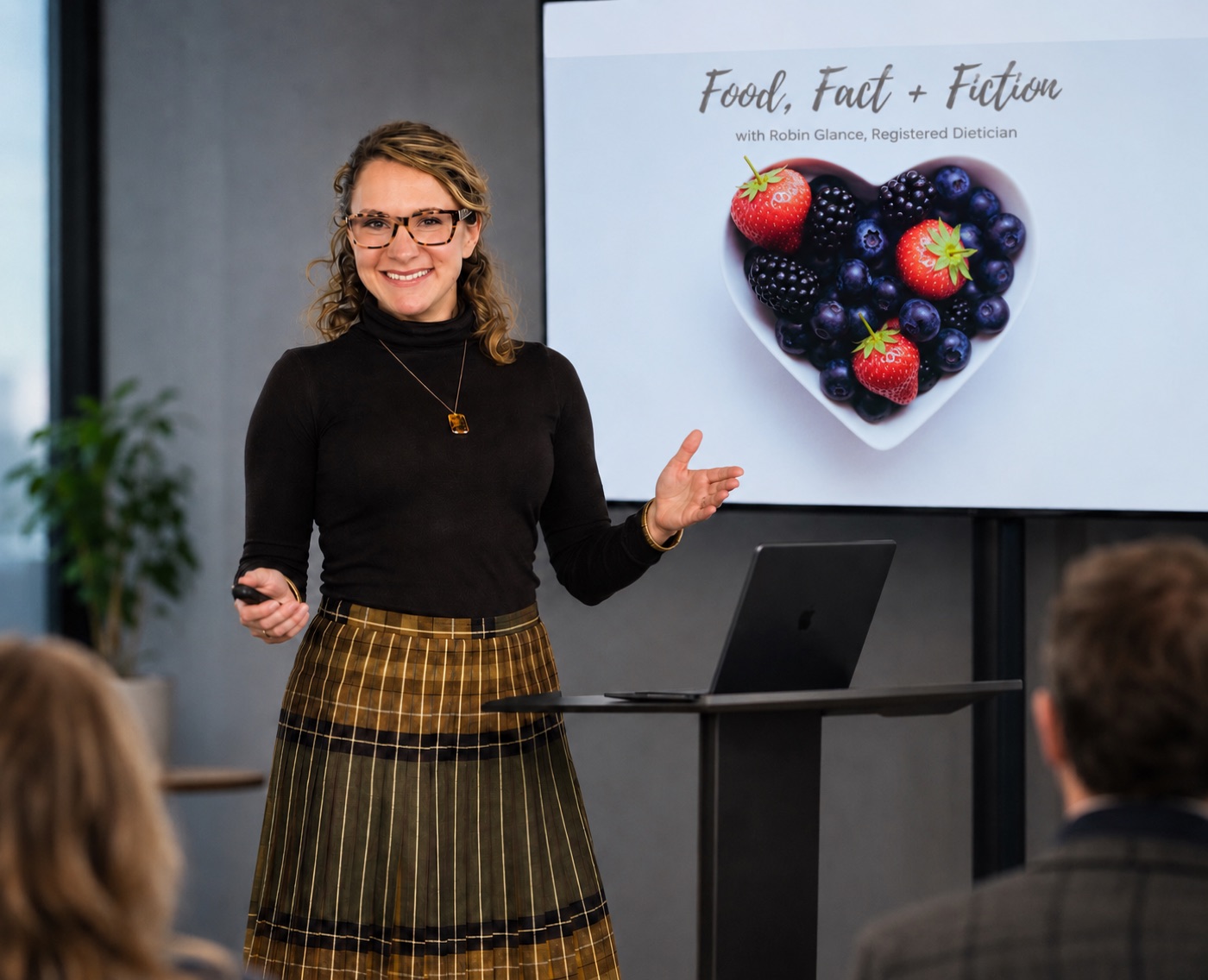 Robin Glance presenting a nutrition talk to a corporate audience